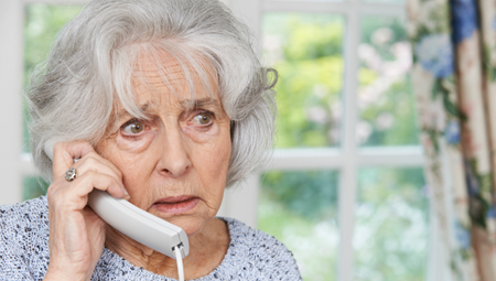 Worried senior on the phone